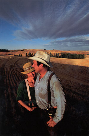 MaryJane and Nick in tilled fields on the Palouse